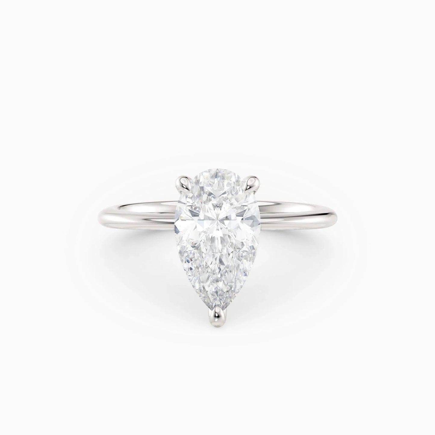 Pear Solitaire Engagement Ring in 18k White Gold (TCW: 1)