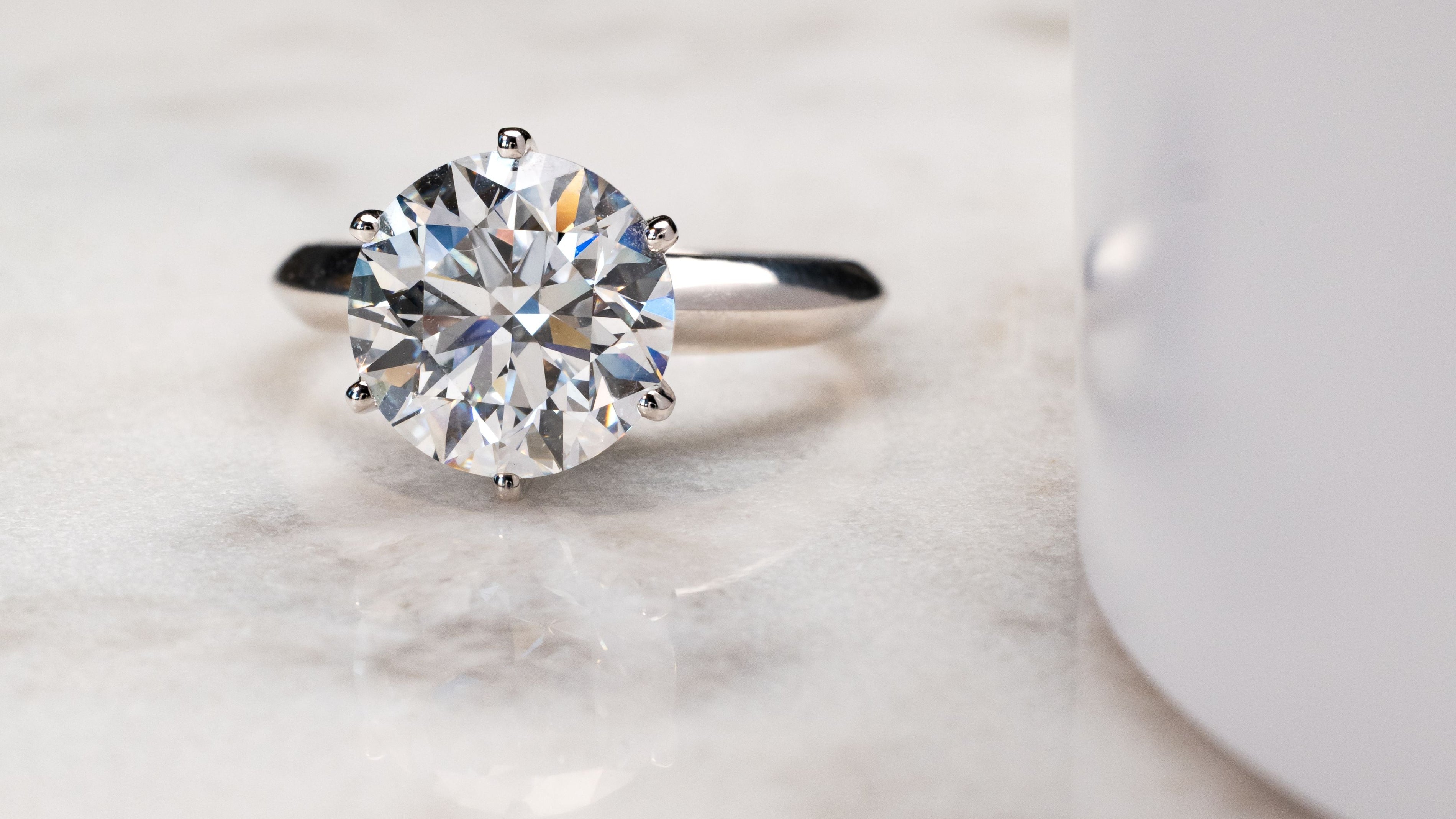 Cushion Cut vs. Round Diamond: Which Should You Choose?