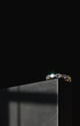 Diamond Wedding band with oval stones with sun glaring as it sparkles
