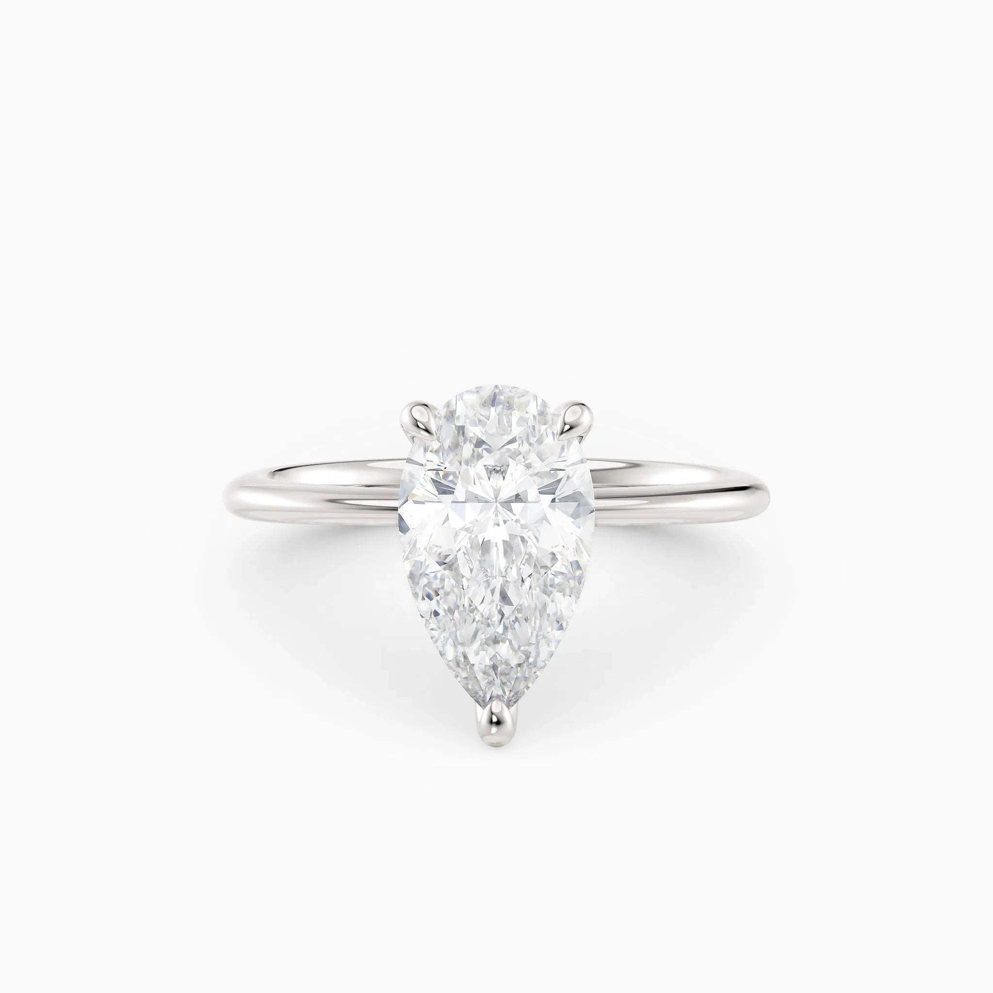 Pear Solitaire Engagement Ring in 18k White Gold (TCW: 1)