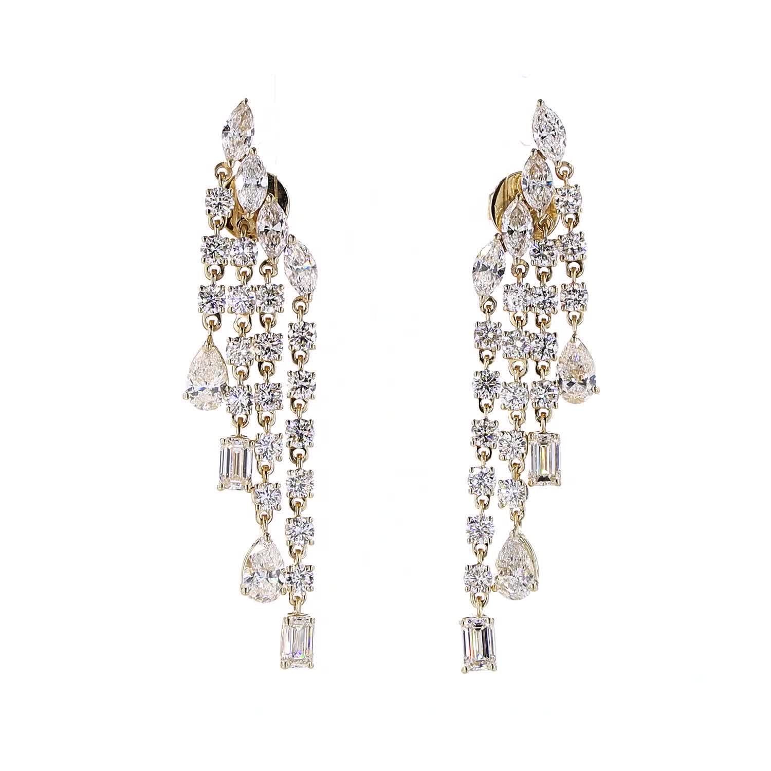 Pair of elegant diamond earrings on a white background
