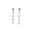 Pair of diamond drop earrings on a white background