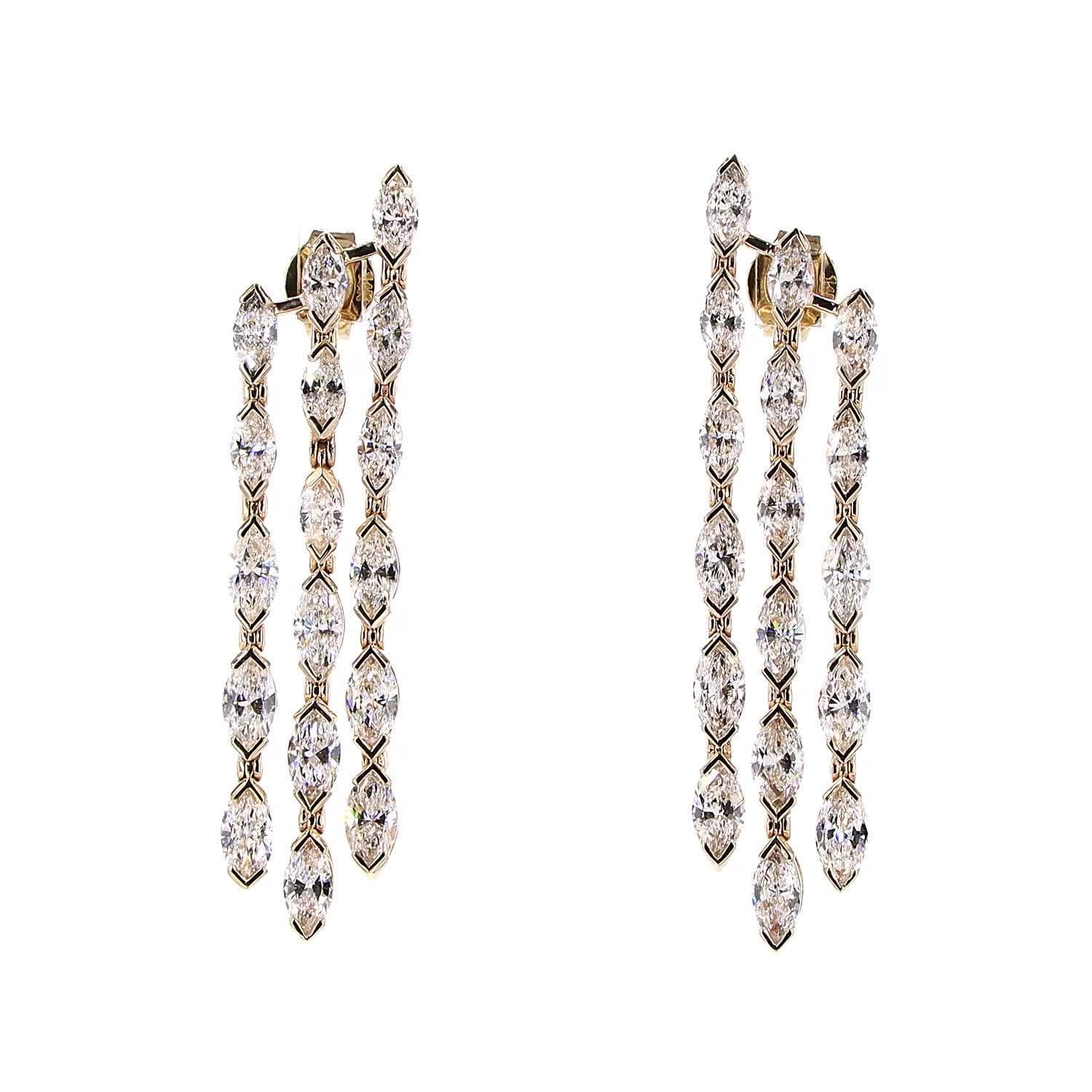 Pair of diamond earrings on a white background